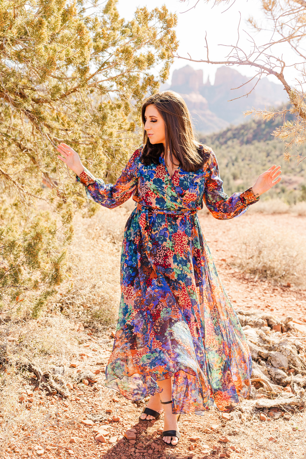 Woman playing with dress in Sedona Arizona