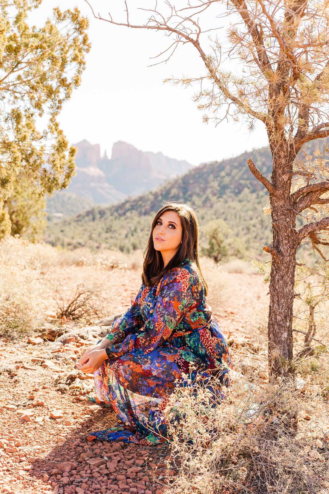 Woman kneeling in Sedona Arizona