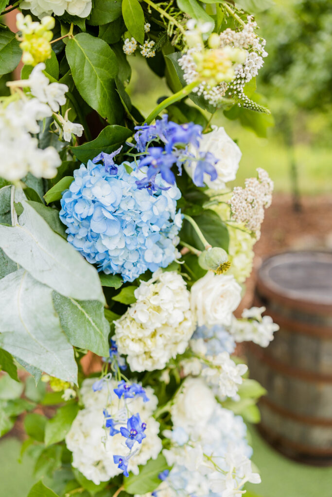 Wedding day florals by Willow Design Wedding ceremony at the Bog in Saukville Wisconsin. 