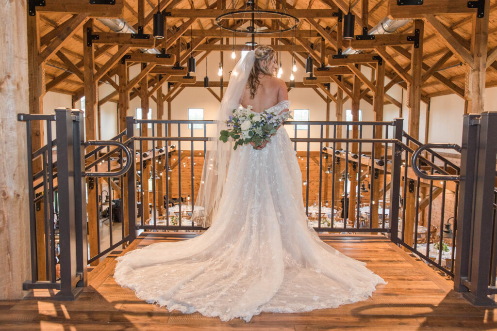 Bride looking over the Bog Barn in Wisconsin. 