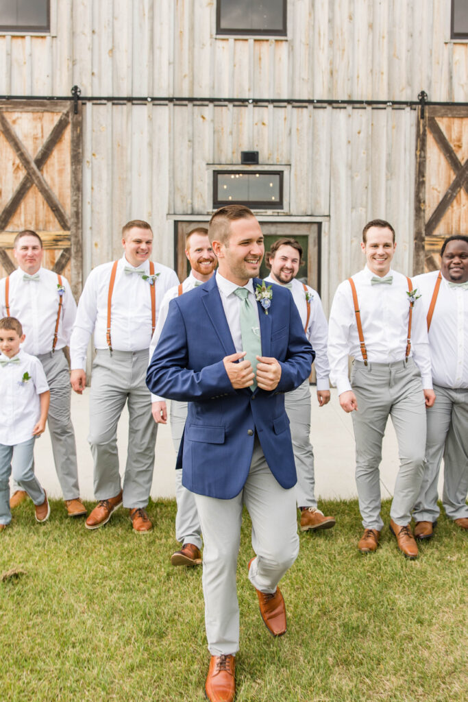 Groom with groomsmen on wedding day. 