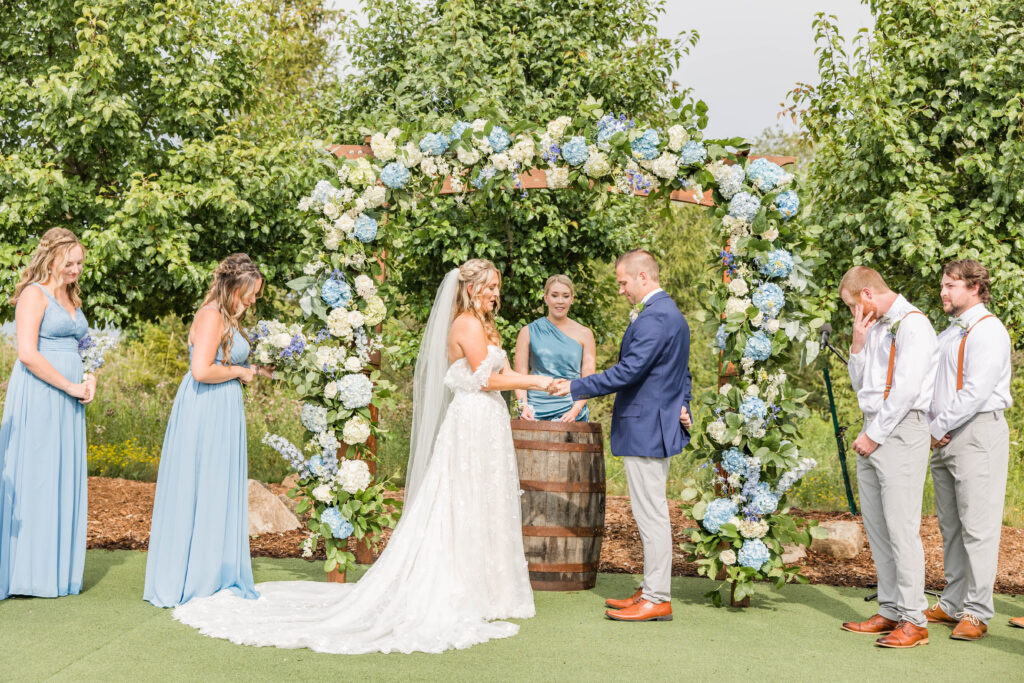 Wedding day florals by Willow Design Wedding ceremony at the Bog in Saukville Wisconsin. 