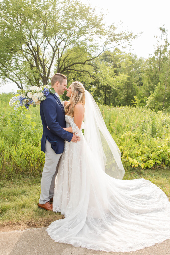 Bride and groom portraits at the Bog in Saukville Wisconsin. Meredith Mutza Photography. 