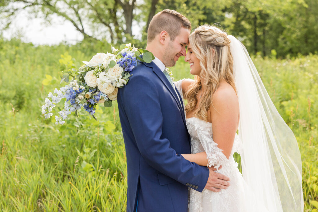 Bride and groom portraits at the Bog in Saukville Wisconsin. Meredith Mutza Photography. 