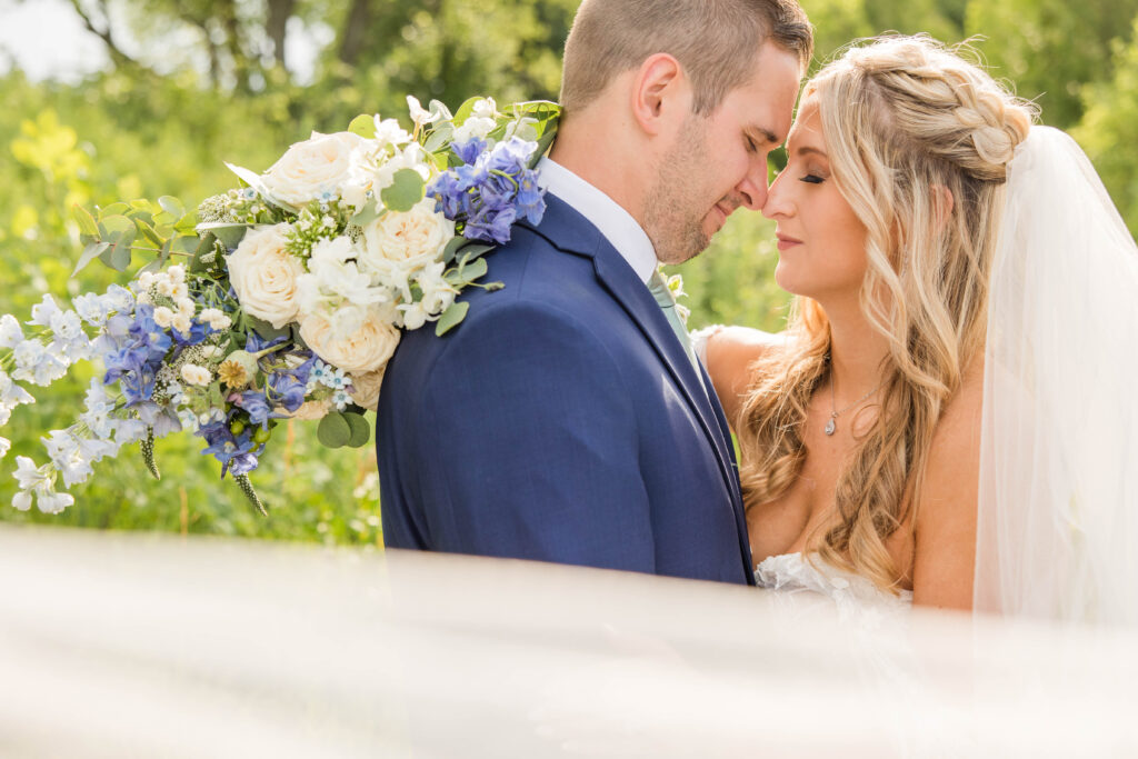 Bride and groom portraits at the Bog in Saukville Wisconsin. Meredith Mutza Photography. 