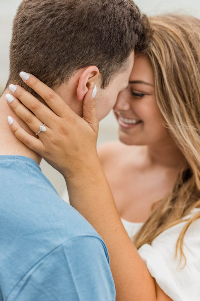 Bride showing off her engagement ring at her engagement session at Lion's Den Gorge Nature preserve, Wisconsin. 