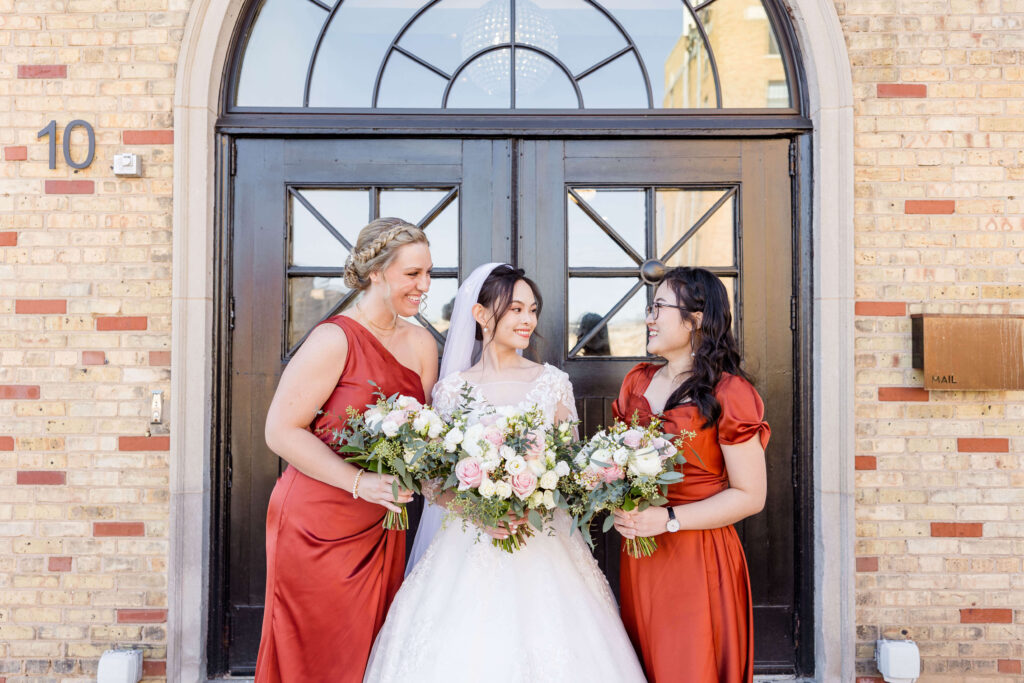 Bride laughing at bridesmaids at 10 South.