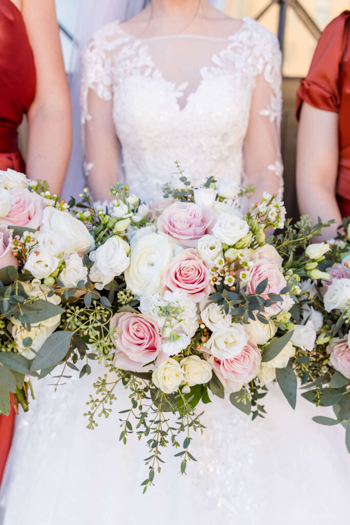 Bride's bouquet with white and pink roses.