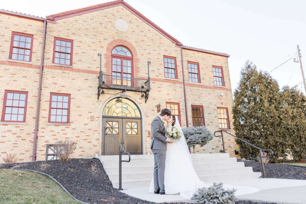 Bride and groom resting foreheads on wedding day at 10 South in Madison, Wisconsin.