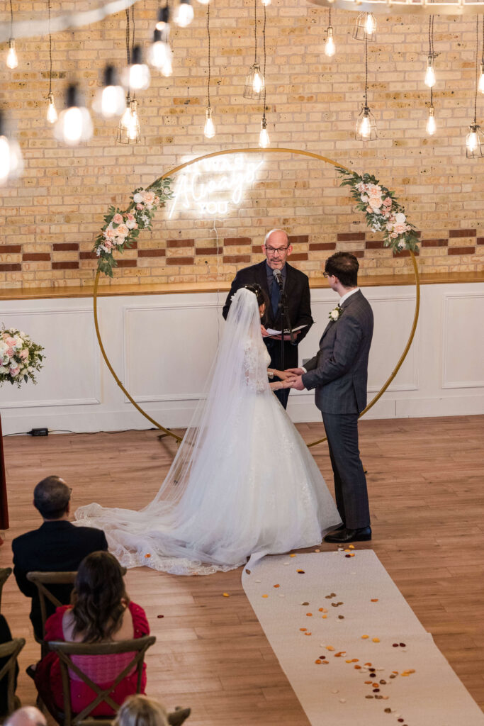 Bride and groom during wedding ceremony. 