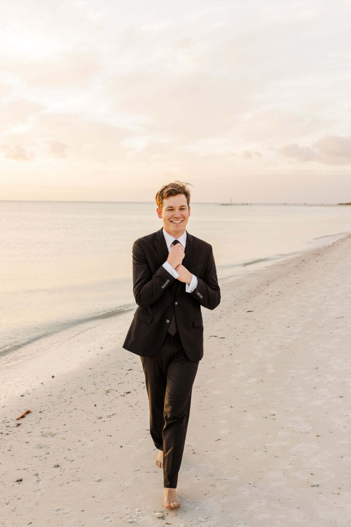 Groom getting ready for destination wedding. 