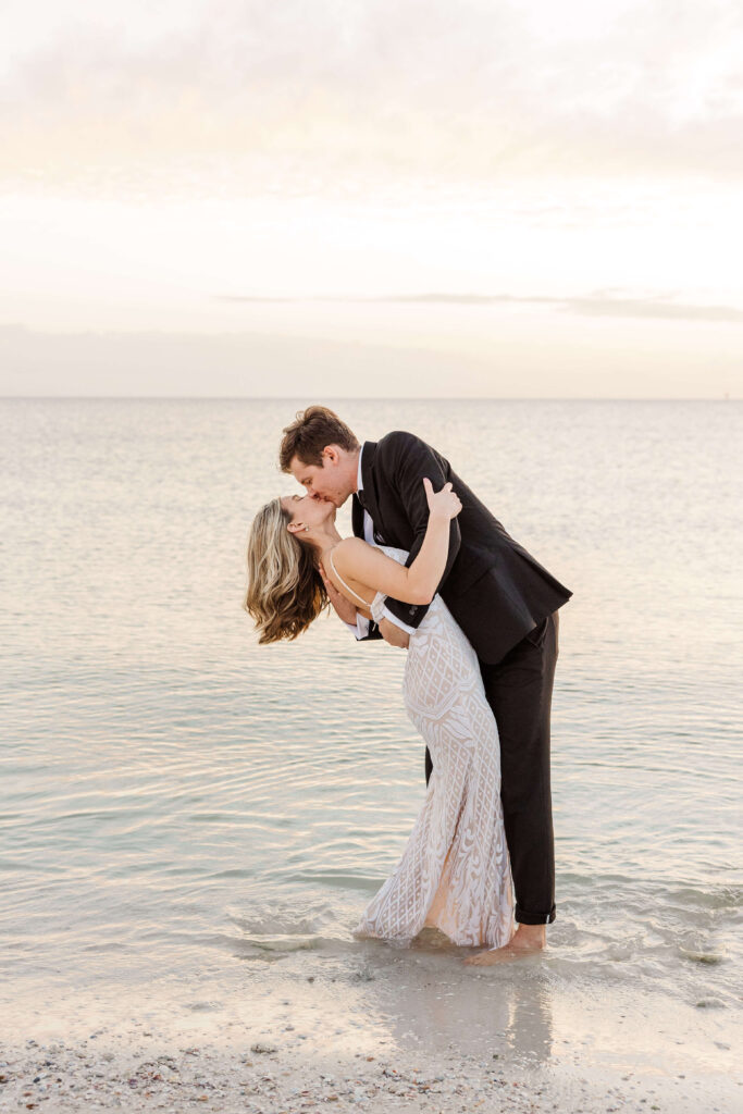 Dip kiss bride and groom destination wedding. 