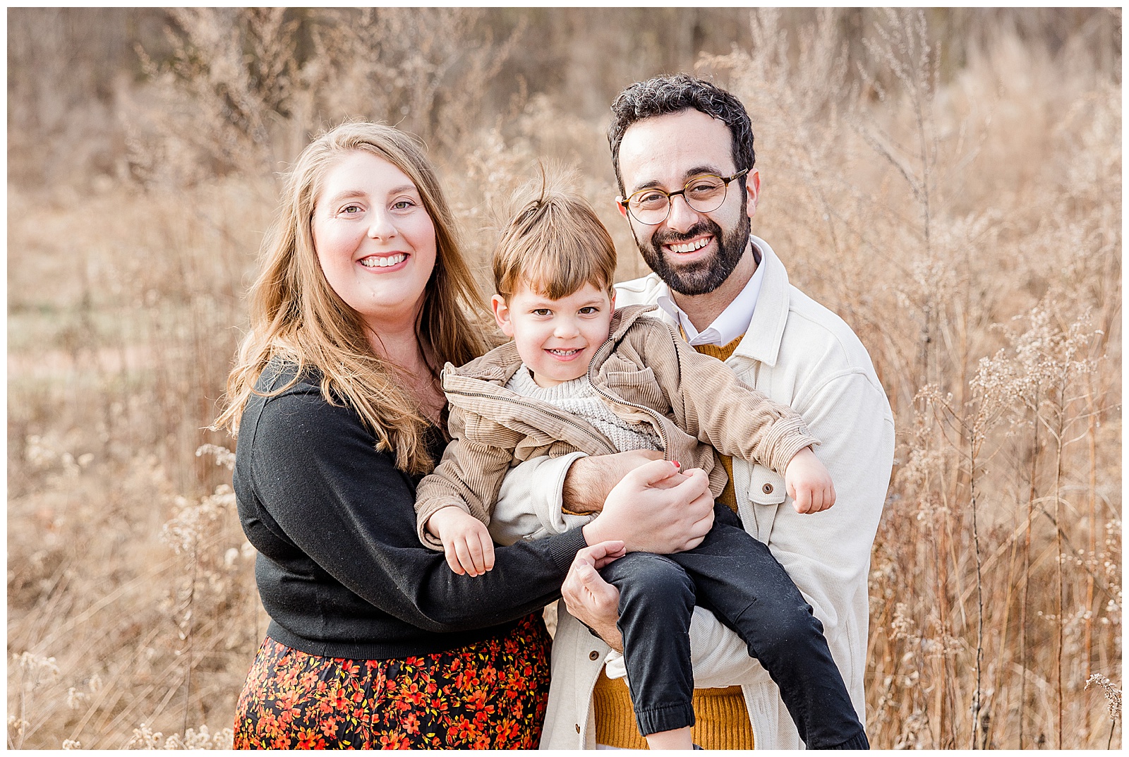 family photo session outside in a field