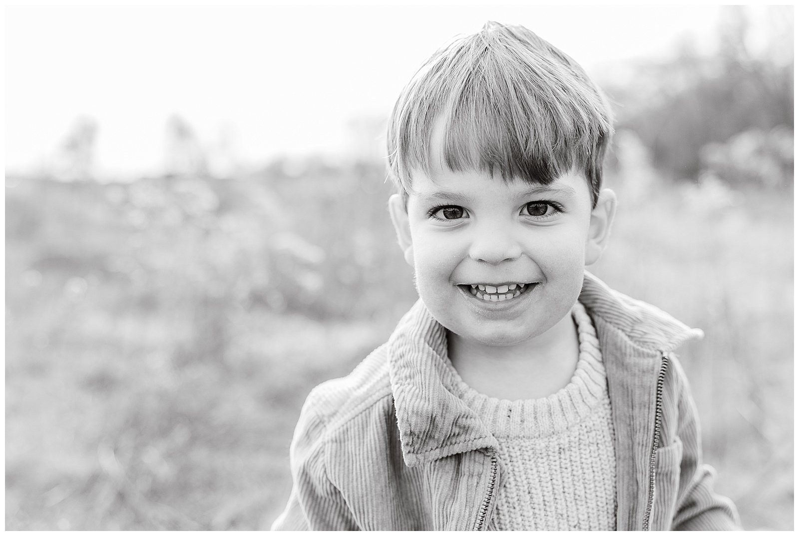 family photo session outside in a field