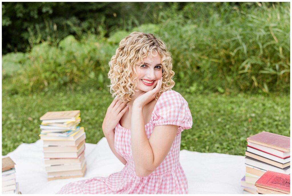 Senior Photoshoot in Delafield, Wisconsin of a blond girl reading, playing the piano, or painting