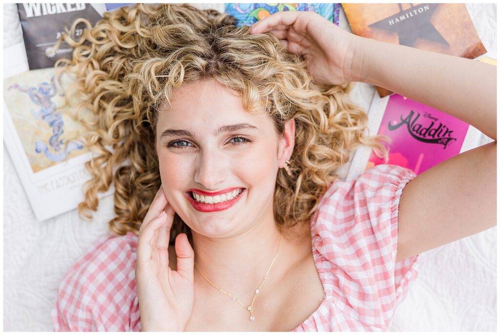 Senior Photoshoot in Delafield, Wisconsin of a blond girl reading, playing the piano, or painting
