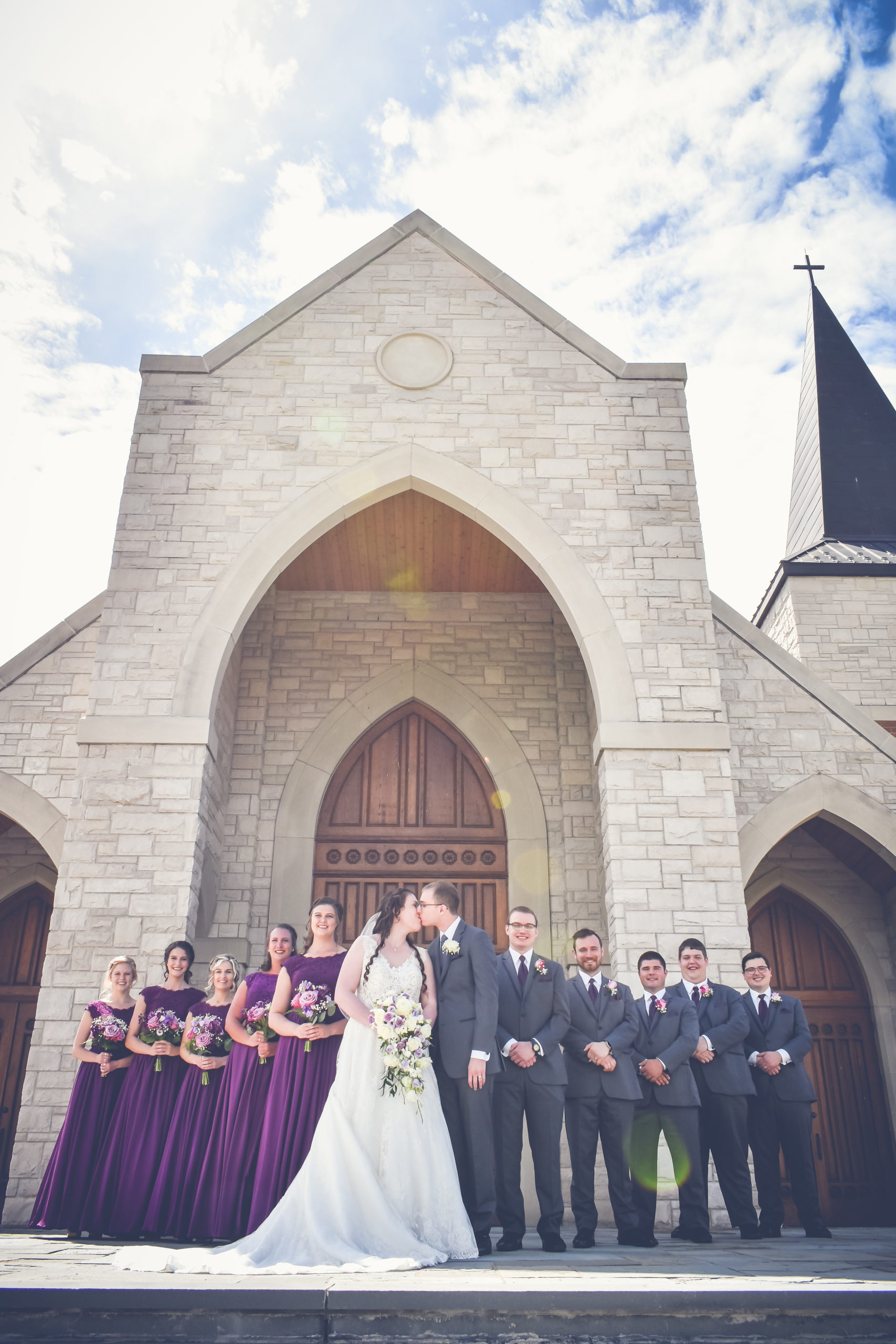 Wedding Party in purple in front of church