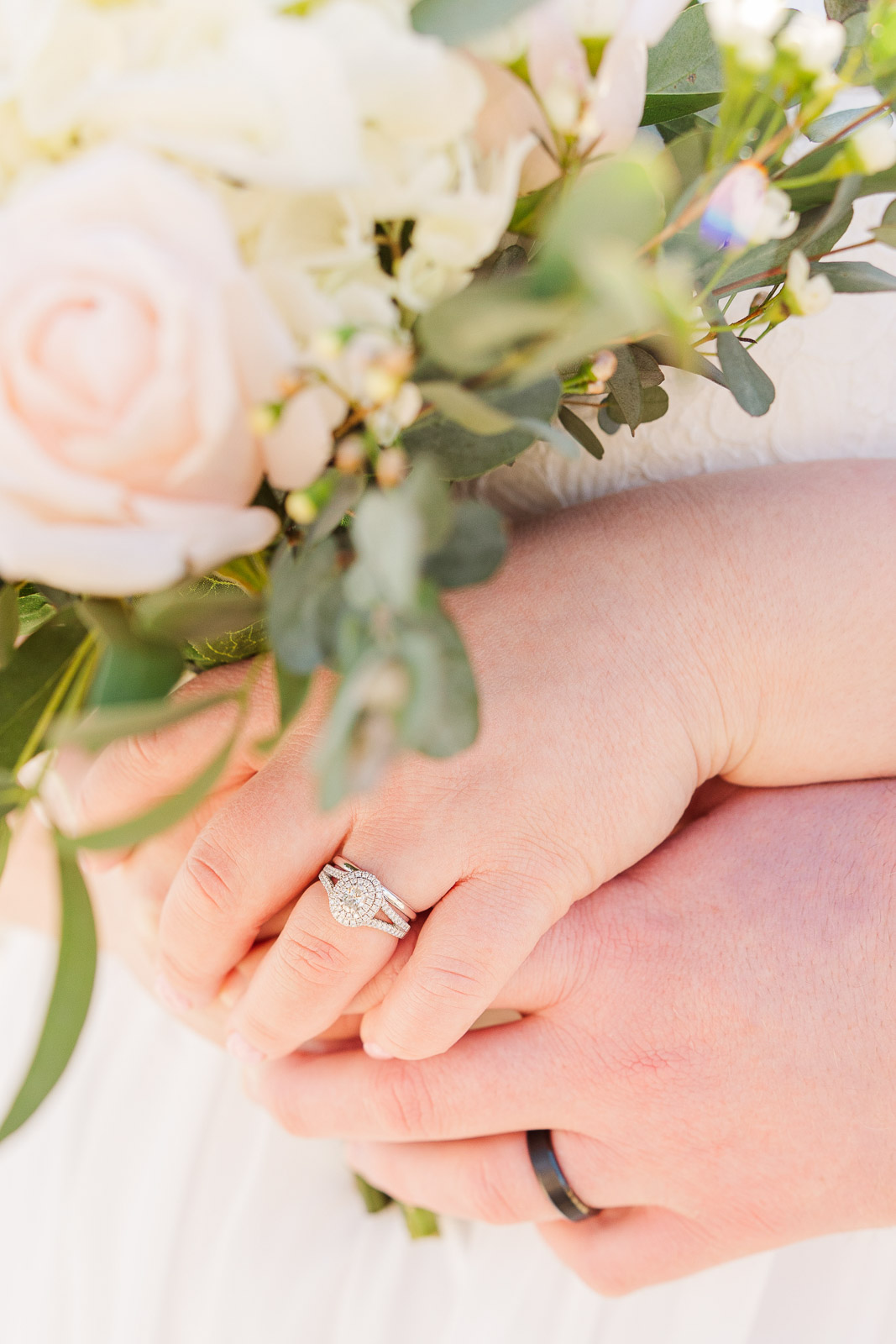 Wedding ring and bouquet shot