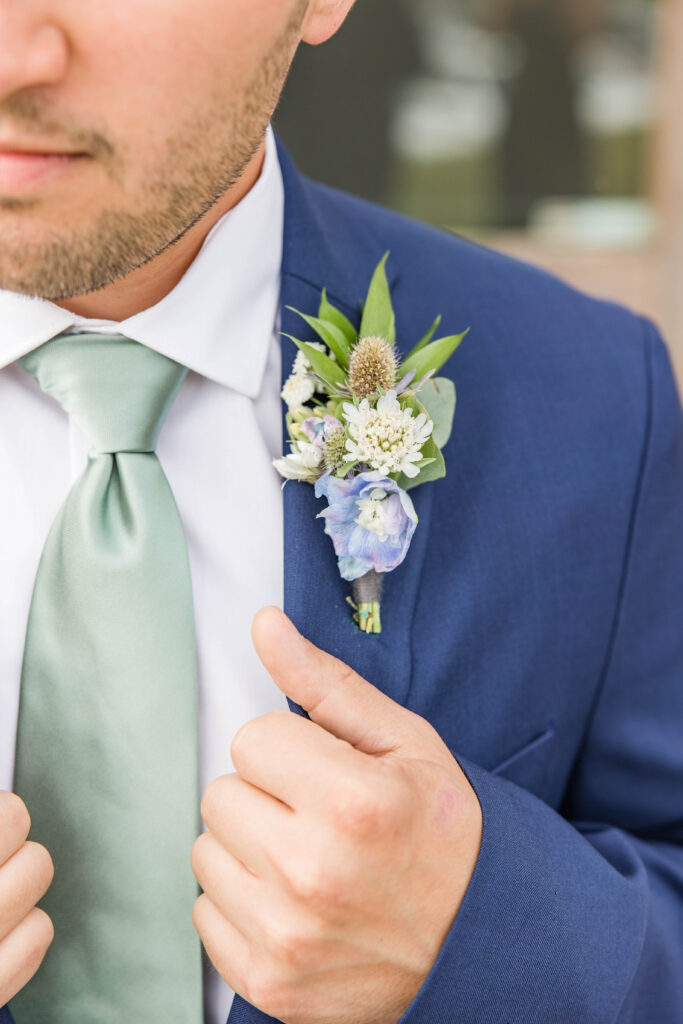 Groom's tie and  boutonniere. 