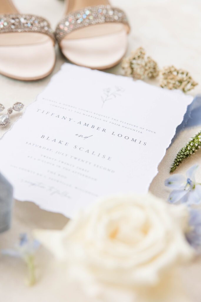 Bridal Detail shot with invitation, shoes and florals.
