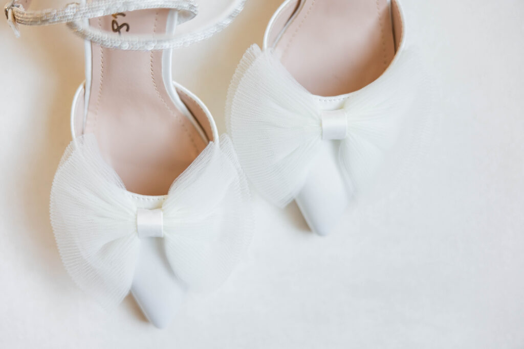 Bride's wedding shoes with bow's.