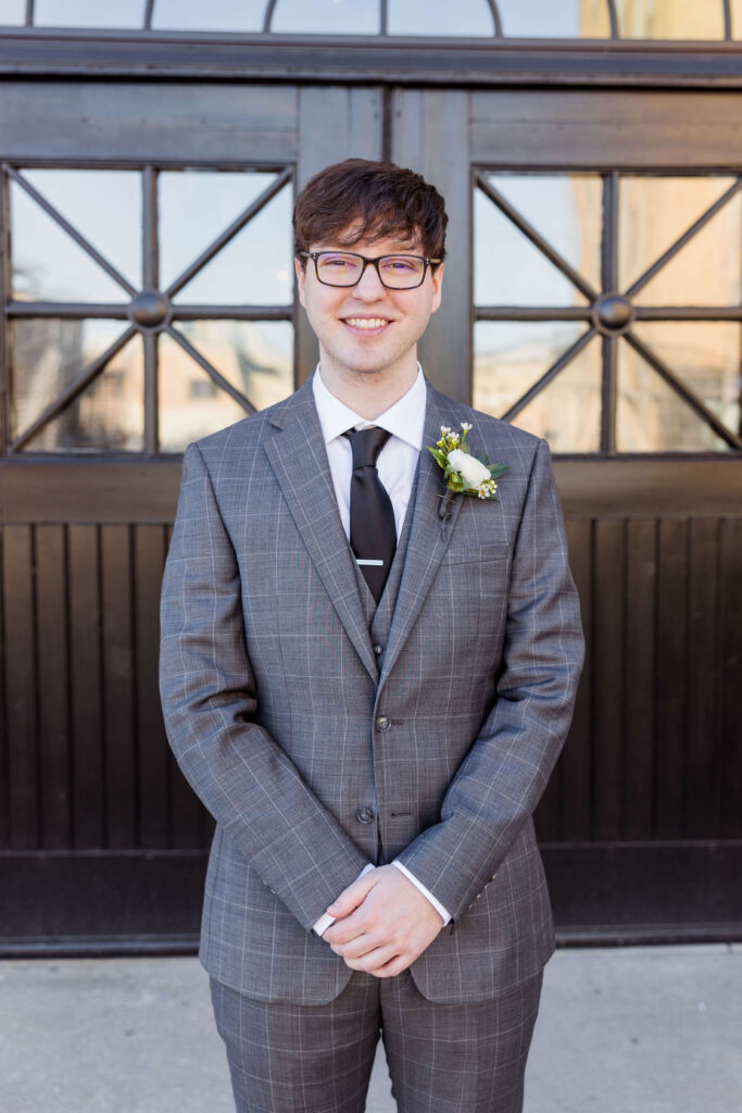 Groom Portrait in front of 10 South in Madison, Wisconsin. 