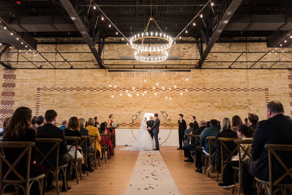 Bride and groom at wedding ceremony at 10 South in Janesville, Wisconsin. 
