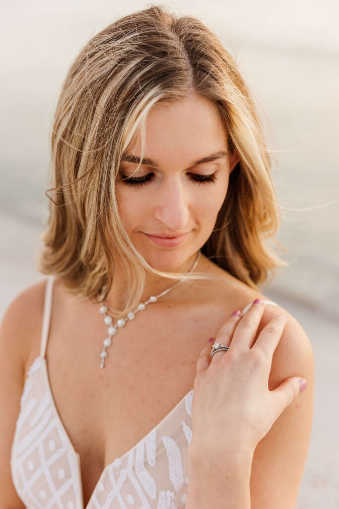 Bride detail photo on the beach on Honeymoon Island in Florida. 